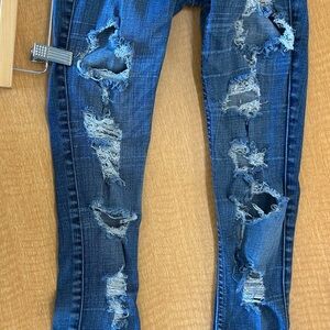 Distressed Blue Jeans